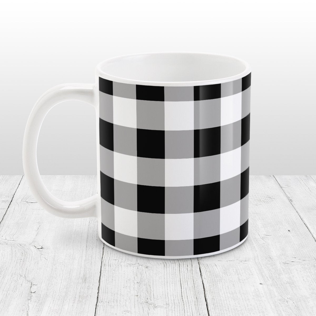 Black and White Buffalo Plaid Mug at Amy's Coffee Mugs. A ceramic coffee mug designed with a black and white buffalo plaid (buffalo check) pattern that wraps around the mug to the handle.