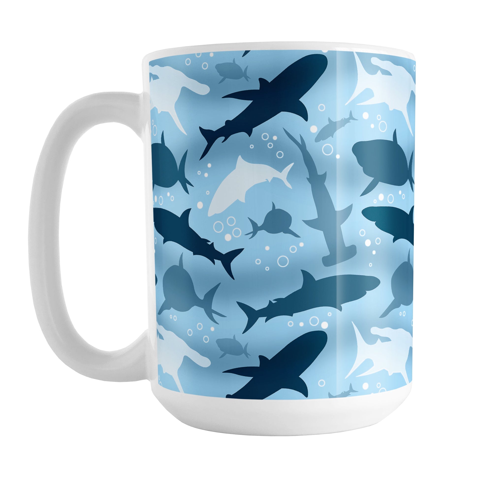 Blue Frenzy Sharks Mug (15oz) at Amy's Coffee Mugs. A ceramic coffee mug designed with a pattern of sharks in different shades of blue, in a frenzy deep beneath the water, that wraps around the mug to the handle.