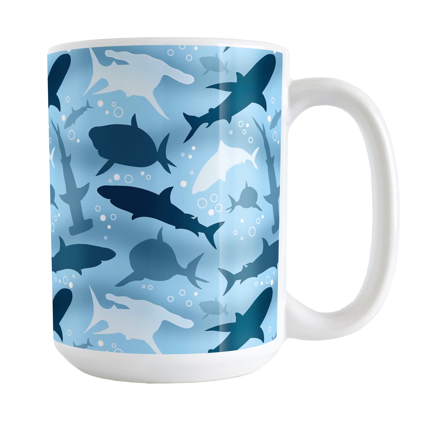 Blue Frenzy Sharks Mug (15oz) at Amy's Coffee Mugs. A ceramic coffee mug designed with a pattern of sharks in different shades of blue, in a frenzy deep beneath the water, that wraps around the mug to the handle.