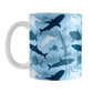 Blue Frenzy Sharks Mug (11oz) at Amy's Coffee Mugs. A ceramic coffee mug designed with a pattern of sharks in different shades of blue, in a frenzy deep beneath the water, that wraps around the mug to the handle.