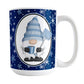 Blue Gnome Snowflakes Mug (15oz) at Amy's Coffee Mugs. A ceramic coffee mug designed with an adorable gnome wearing a festive blue winter hat and holding a hot beverage and a snow shovel in a white oval over a blue night snowflakes background that wraps around the mug to the handle.
