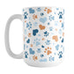 Blue Hearts and Paw Prints Mug (15oz) at Amy's Coffee Mugs. A ceramic coffee mug designed with a pattern of hearts and paw prints in orange and different shades of blue that wraps around the mug to the handle. This mug is perfect for people love dogs and cute paw print designs.