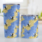 Blue Honeycomb Bee Tumbler Cup (20oz and 10oz, stainless steel insulated) at Amy's Coffee Mugs. Tumbler cups designed with a pattern of black and yellow bees on honeycomb lines over a blue flourish background that wraps around the cups. Photo shows both sized cups next to each other.