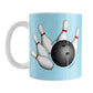 Bowling Ball and Pins Blue Bowling Mug (11oz) at Amy's Coffee Mugs. A ceramic coffee mug designed with an illustration of a bowling ball striking bowling pins on both sides of the mug over a light blue background color that wraps around the mug up to the handle.