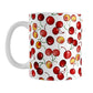 Cherries Mug (11oz) at Amy's Coffee Mugs. A ceramic coffee mug designed with different colors and types of cherries in a pattern that wraps around the mug to the handle.