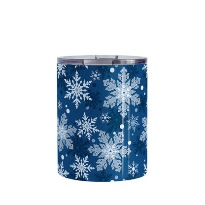 Classic Blue Snowflake Pattern Winter Tumbler Cup (10oz, stainless steel insulated) at Amy's Coffee Mugs. A tumbler cup designed with a pattern of different shades of blue snowflakes over a classic blue background color that wraps around the cup.