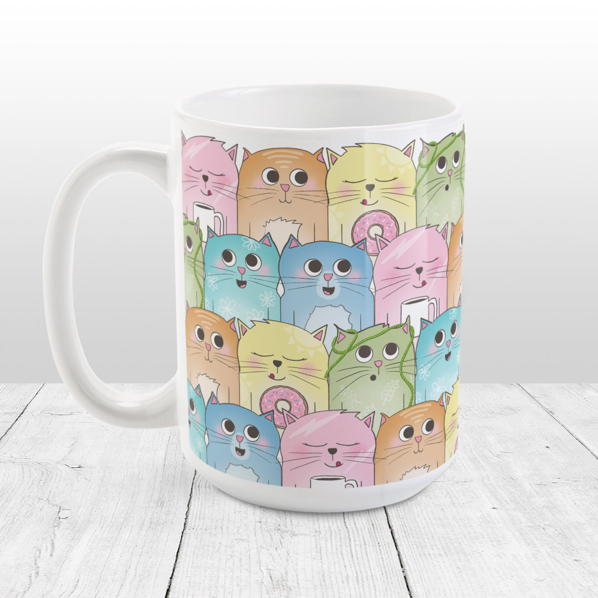 Colorful Cat Stack Pattern Mug (15oz) at Amy's Coffee Mugs. Cute cats mug with an illustrated pattern of different colorful cats (in pink, orange, yellow, green, turquoise, and blue) with different fun expressions, with yarn, coffee, and donuts. This stacked pattern of cats wraps around the ceramic mug to the handle.