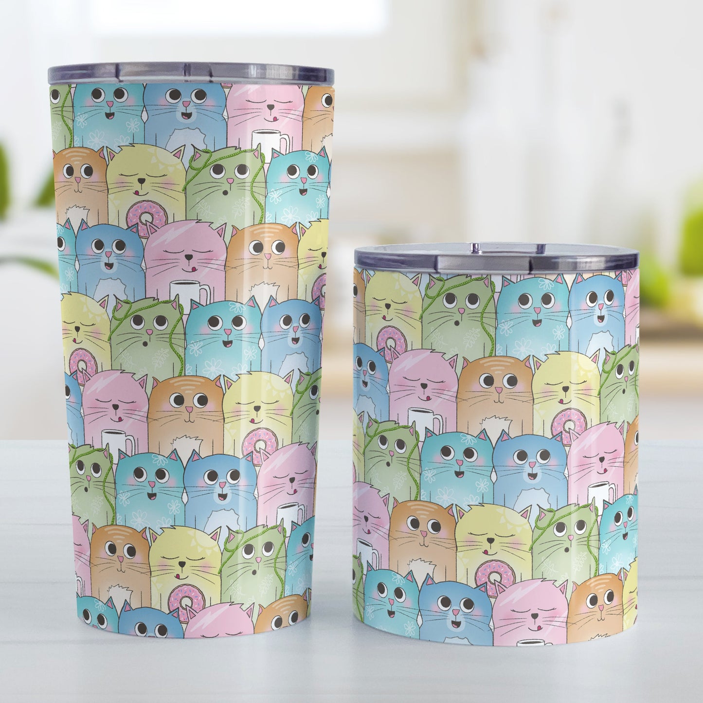 Colorful Cat Stack Pattern Tumbler Cup (20oz and 10oz, stainless steel insulated) at Amy's Coffee Mugs. Cute cats tumbler cup with an illustrated pattern of different colorful cats (in pink, orange, yellow, green, turquoise, and blue) with different fun expressions, with yarn, coffee, and donuts. This stacked pattern of cats wraps around the cup. Picture shows both cup sizes next to each other.