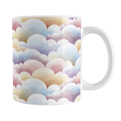 Colorful Clouds Mug (11oz) at Amy's Coffee Mugs. A ceramic coffee mug designed with whimsical and colorful clouds in a pattern that wraps around the mug to the handle.