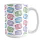 Colorful Pastel Macarons Mug (15oz) at Amy's Coffee Mugs. A ceramic coffee mug designed with colorful pastel macarons colored in pink, purple, green, and blue in a pattern that wraps around the mug to the handle.