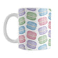 Colorful Pastel Macarons Mug (11oz) at Amy's Coffee Mugs. A ceramic coffee mug designed with colorful pastel macarons colored in pink, purple, green, and blue in a pattern that wraps around the mug to the handle.