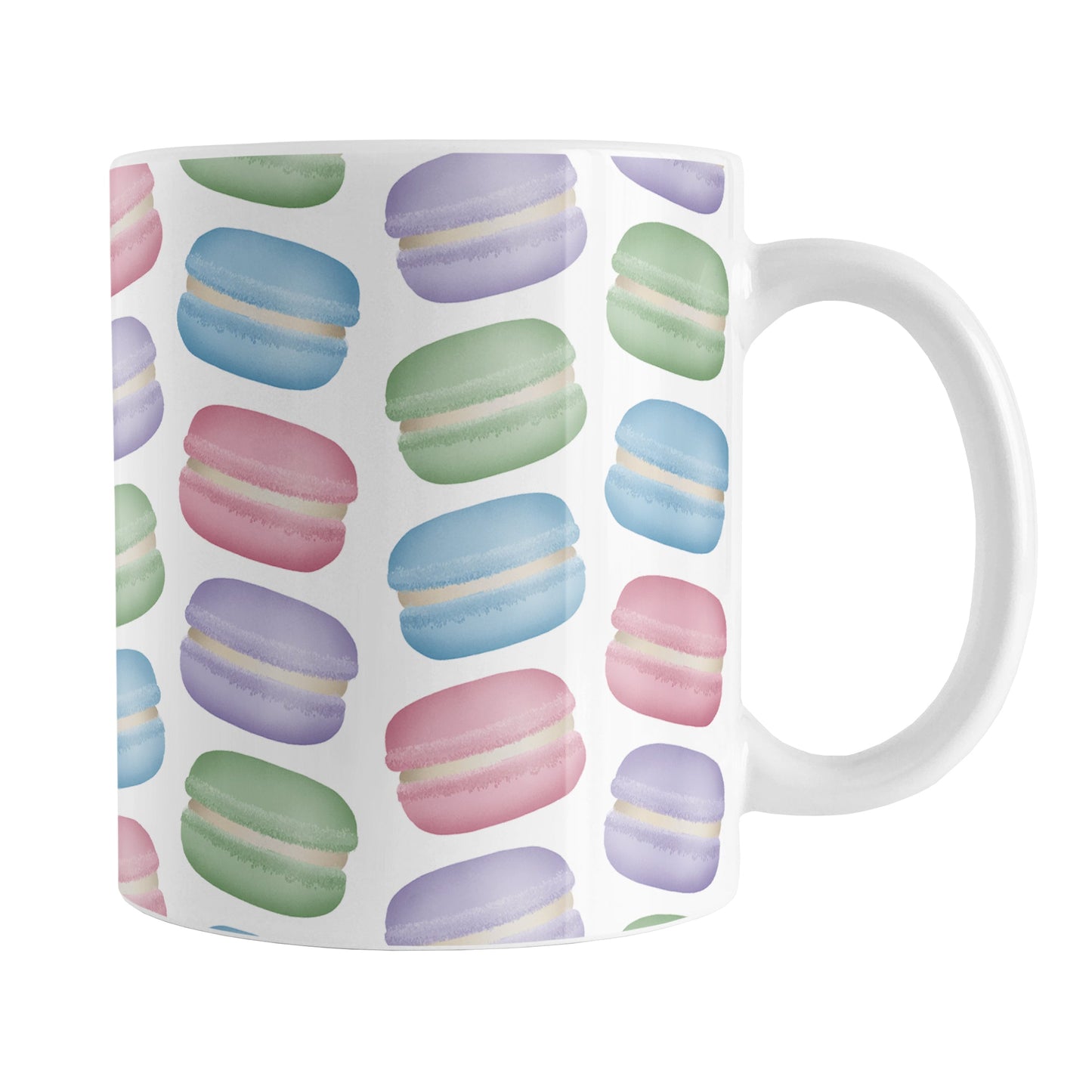 Colorful Pastel Macarons Mug (11oz) at Amy's Coffee Mugs. A ceramic coffee mug designed with colorful pastel macarons colored in pink, purple, green, and blue in a pattern that wraps around the mug to the handle.