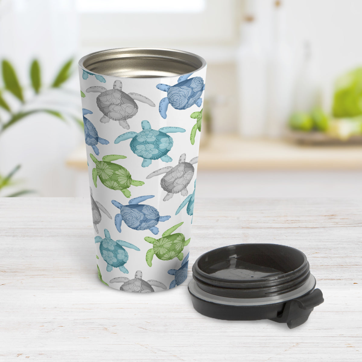 Cool Sea Turtles Pattern Travel Mug (15oz, stainless steel insulated) at Amy's Coffee Mugs. A travel mug with a pattern of sea turtles in a cool color palette of blue, green, turquoise and gray that wraps around the travel mug. Each cool colored sea turtle has a different floral watermark over its shell.