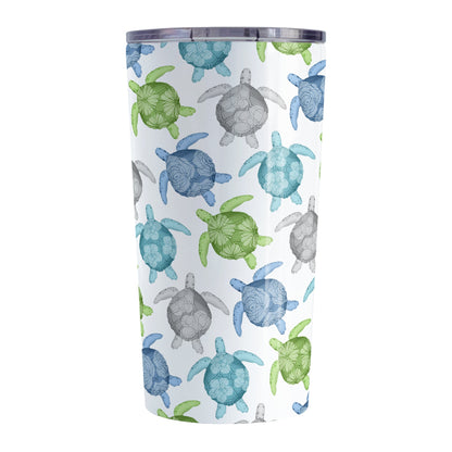 Cool Sea Turtles Pattern Tumbler Cup (20oz, stainless steel insulated) at Amy's Coffee Mugs. A tumbler cup with a pattern of sea turtles in a cool color palette of blue, green, turquoise and gray that wraps around the cup. Each cool colored sea turtle has a different floral watermark over its shell.