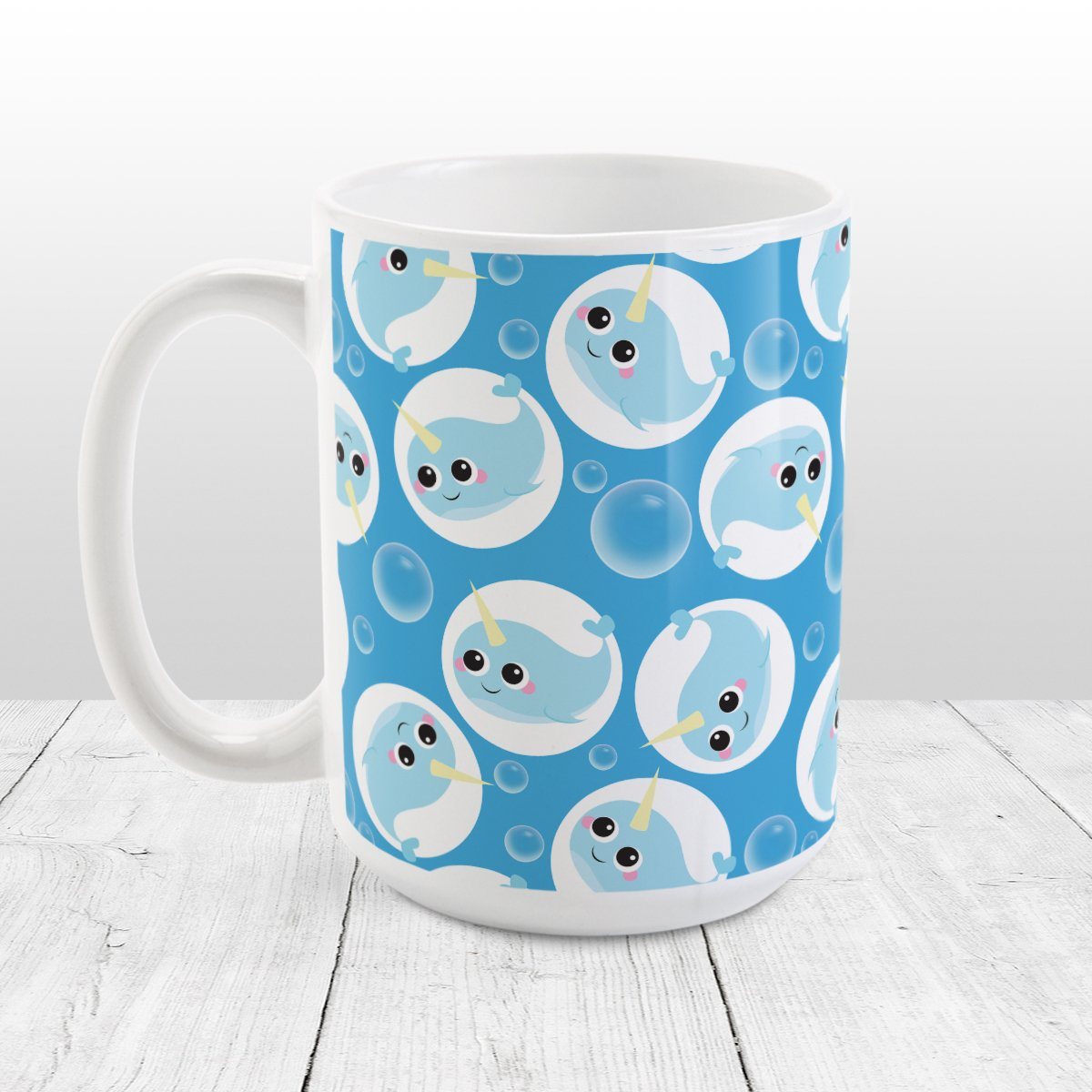 https://amyscoffeemugs.com/cdn/shop/products/cute-narwhal-bubble-pattern-blue-narwhal-mug-at-amys-coffee-mugs-120990.jpg?v=1647007340