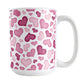 Cute Pink Hearts Pattern Mug (15oz) at Amy's Coffee Mugs. A ceramic coffee mug designed with a multi-directional pattern of cute hearts in different shades of pink that wrap around the mug to the handle.