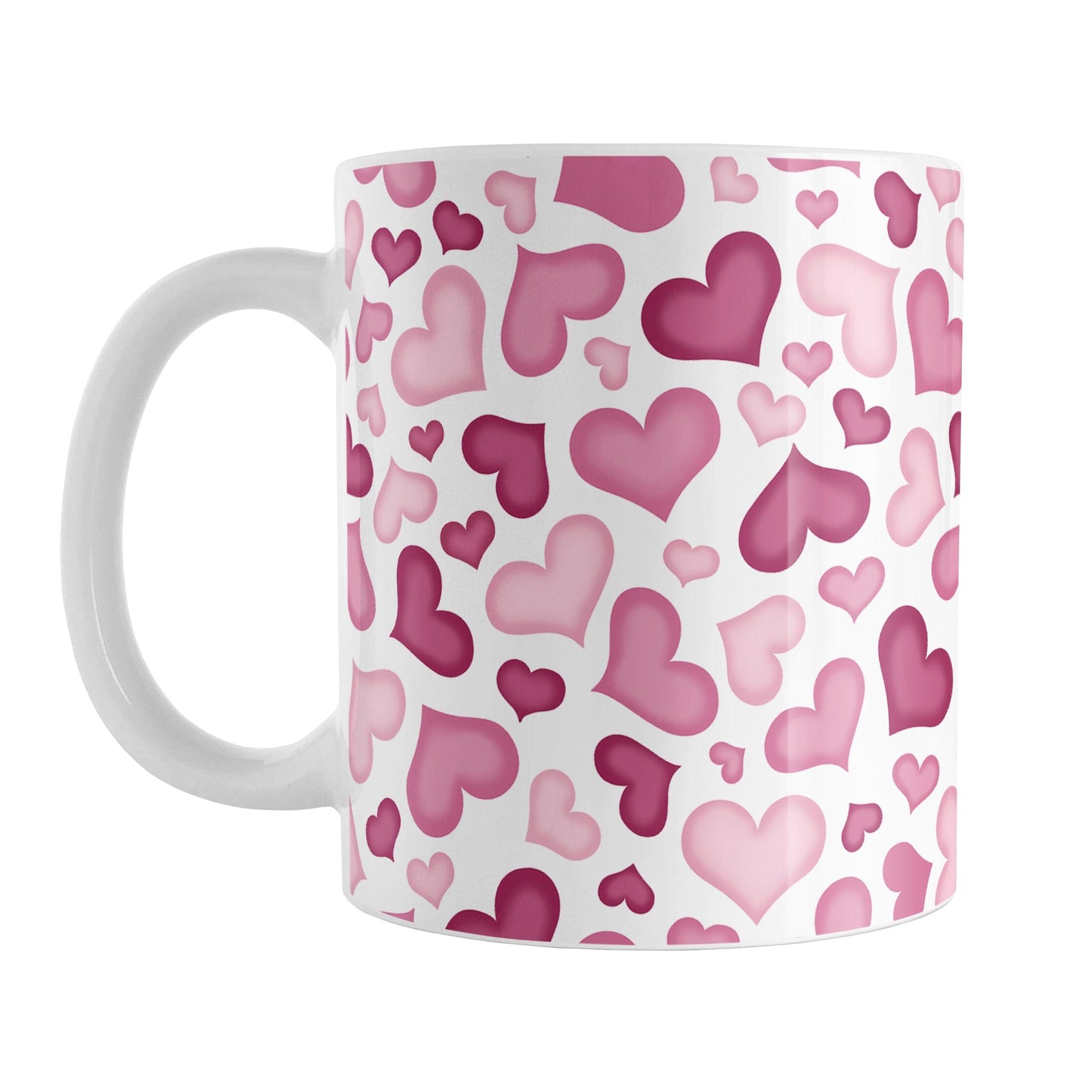 Cute Pink Hearts Pattern Mug (11oz) at Amy's Coffee Mugs. A ceramic coffee mug designed with a multi-directional pattern of cute hearts in different shades of pink that wrap around the mug to the handle.