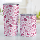 Cute Pink Hearts Pattern Tumbler Cup (20oz or 10oz) at Amy's Coffee Mugs. Stainless steel tumbler cups designed with a pattern of cute hearts in different shades of pink that wrap around the cups. Photo shows both sized cups next to each other on a table. 