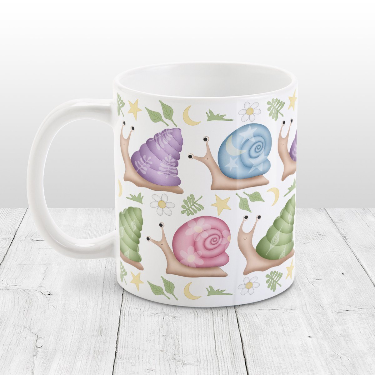 Cute Spring Summer Snails Pattern Mug at Amy's Coffee Mugs. A cute snails mug with a whimsical pattern of snails with happy faces in two rows around the mug with pink, purple, blue, and green shells floral and stars watermarks, with foliage, moons, and stars between the rows.