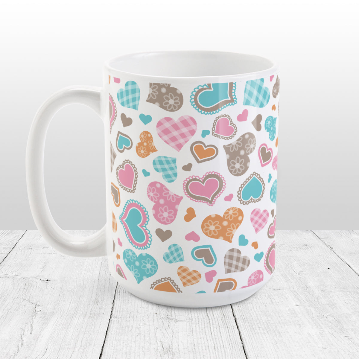 Cutesy Hearts Pattern Mug (15oz) at Amy's Coffee Mugs. This ceramic coffee mug is designed with adorable little hearts in pink, turquoise, orange, and brown. This pattern of cute hearts wraps around the mug to the handle.
