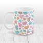 Cutesy Hearts Pattern Mug (11oz) at Amy's Coffee Mugs. This ceramic coffee mug is designed with adorable little hearts in pink, turquoise, orange, and brown. This pattern of cute hearts wraps around the mug to the handle.