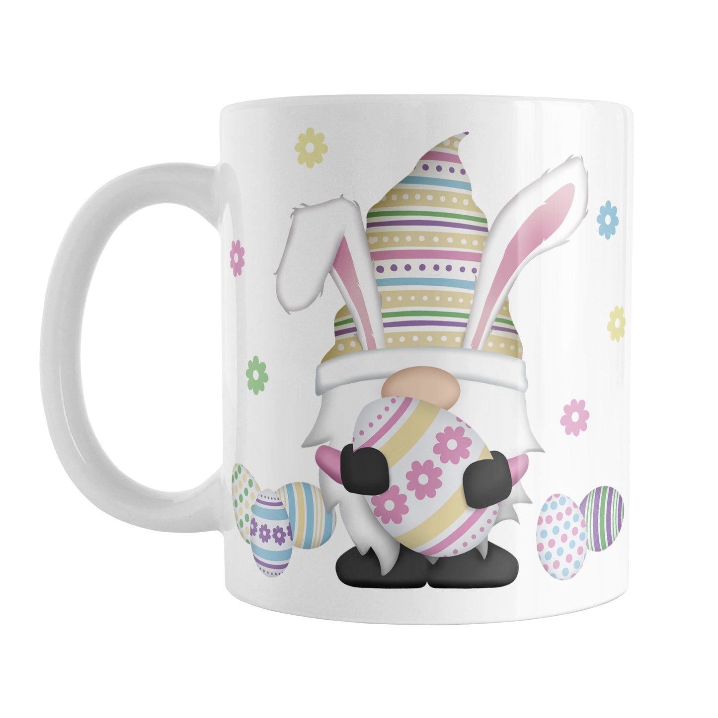 Easter Eggs Bunny Gnome Mug (11oz) at Amy's Coffee Mugs. A ceramic coffee mug designed with an adorable gnome with bunny ears and holding a large Easter egg. Colorful little Easter eggs lay on the ground beside him with little flowers floating around.