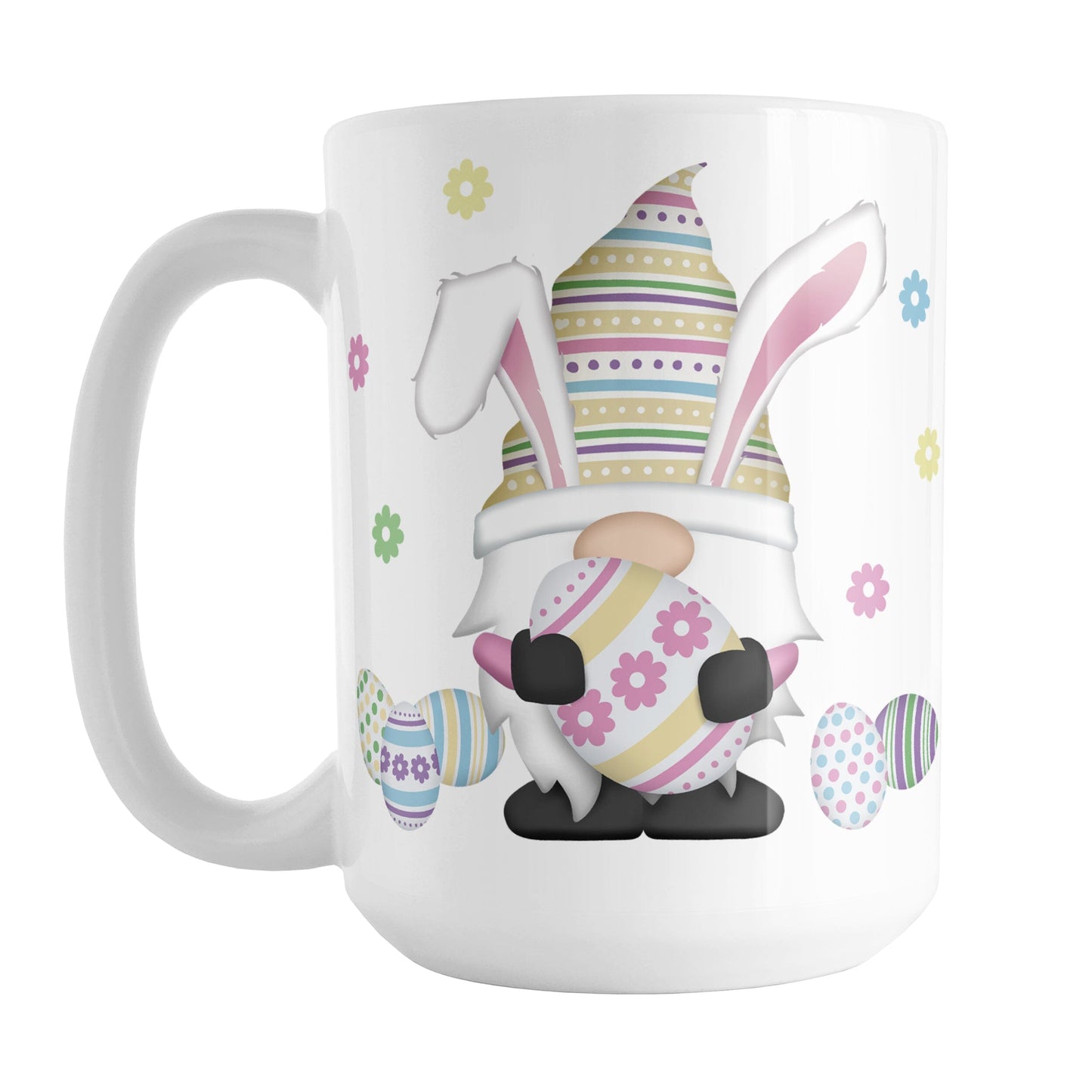 Easter Eggs Bunny Gnome Mug (15oz) at Amy's Coffee Mugs. A ceramic coffee mug designed with an adorable gnome with bunny ears and holding a large Easter egg. Colorful little Easter eggs lay on the ground beside him with little flowers floating around.