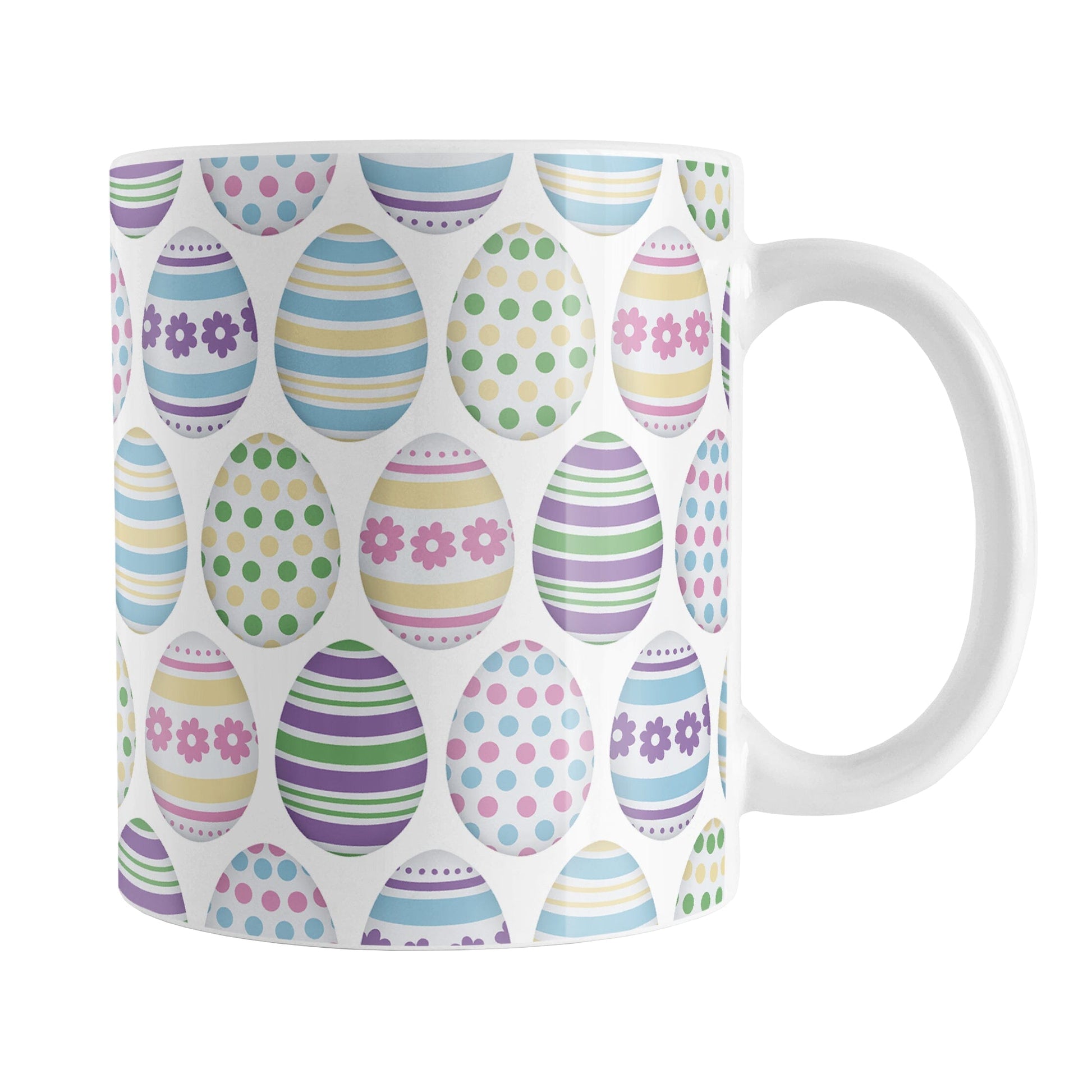 Easter Eggs Mug (11oz) at Amy's Coffee Mugs. A ceramic coffee mug designed with a pattern of Easter eggs decorated with stripes, polka dots, and flowers in fun Easter-inspired colors.