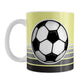 Gray Gradient Lined Yellow Soccer Ball Mug (11oz) at Amy's Coffee Mugs. A ceramic coffee mug designed with a big soccer ball on both sides of the mug over gradient black to gray lines along the bottom over a yellow background color that wraps around the mug up to the handle.