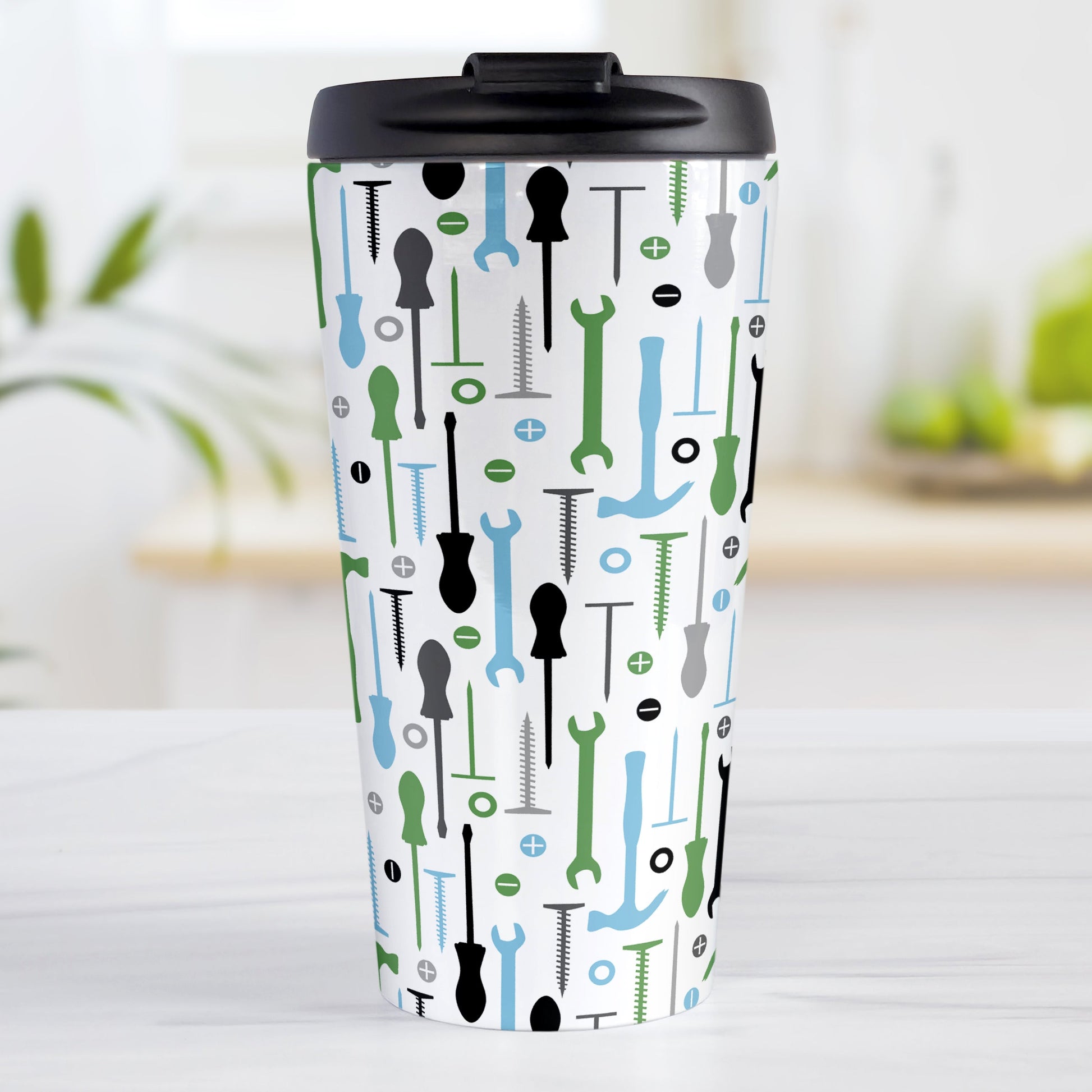 Green Blue Tools Pattern Travel Mug (15oz) at Amy's Coffee Mugs. A stainless steel insulated travel mug with a modern style pattern of tools in green, blue, black, and gray over white that wraps around the mug. Perfect for any handyman or contractor. 