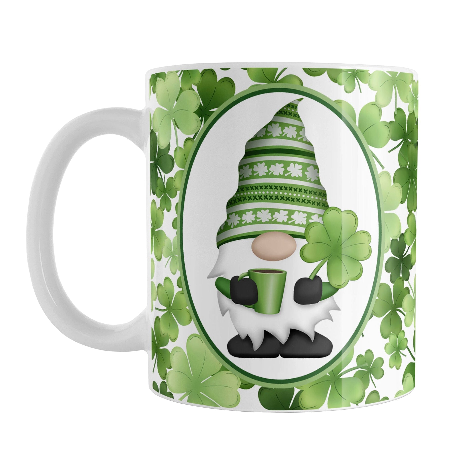 Green Gnome Shamrocks Mug (11oz) at Amy's Coffee Mugs. A ceramic coffee mug designed with an adorable green hat gnome holding a 4-leaf clover and a hot beverage in a white oval over a pattern of green shamrocks in different shades of green that wrap around the mug to the handle.