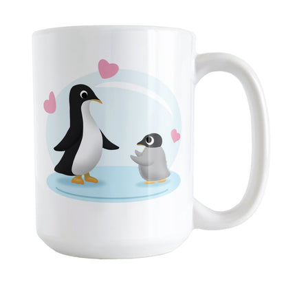 15 oz penguin mug with an adult black-and-white penguin facing a fluffy gray baby penguin, surrounded by pink hearts on a pale blue background design.
