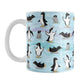 Penguin Parade Pattern Mug (11oz) at Amy's Coffee Mugs. Penguin Parade Pattern Mug (11oz) at Amy's Coffee Mugs. A ceramic coffee mug designed with a fun penguin parade pattern featuring a variety of penguins and baby penguins over an Antarctic background with waves of blue, turquoise, and purple colors with hints of snowflakes that wraps around the mug.