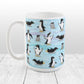 Penguin Parade Pattern Mug at Amy's Coffee Mugs. A 15oz ceramic coffee mug designed with a fun penguin parade pattern featuring a variety of penguins and baby penguins over an Antarctic background with waves of blue, turquoise, and purple colors with hints of snowflakes that wraps around the mug.