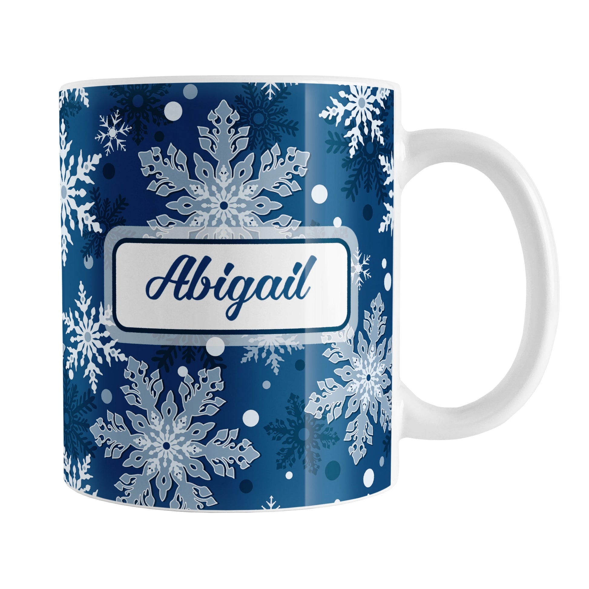 Personalized Classic Blue Snowflake Winter Mug (11oz) at Amy's Coffee Mugs. A ceramic coffee mug designed with a pattern of different shades of blue snowflakes over a classic blue background color that wraps around the mug to the handle. Your name is custom printed in a blue script font on both sides of the mug. 