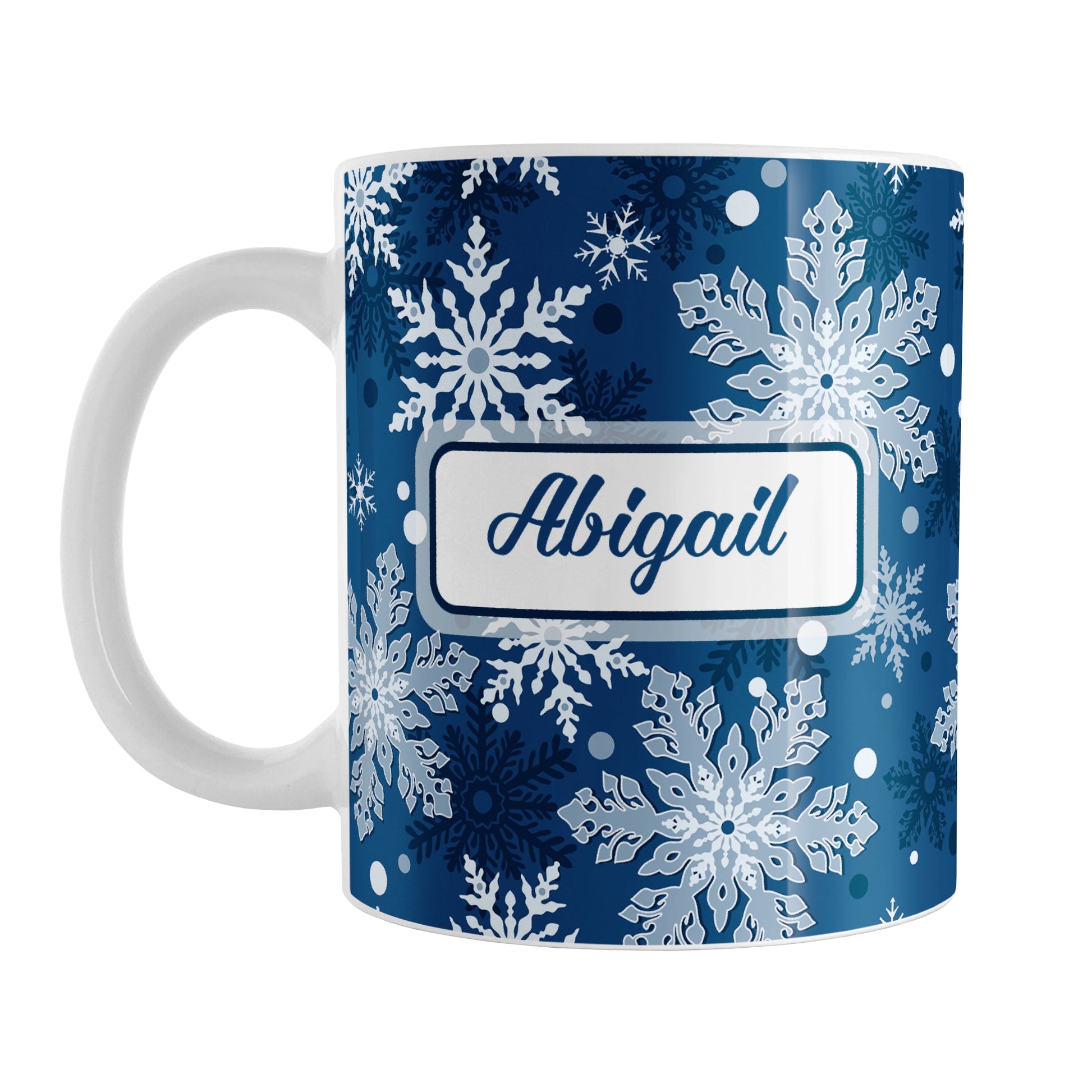 Personalized Classic Blue Snowflake Winter Mug (11oz) at Amy's Coffee Mugs. A ceramic coffee mug designed with a pattern of different shades of blue snowflakes over a classic blue background color that wraps around the mug to the handle. Your name is custom printed in a blue script font on both sides of the mug. 