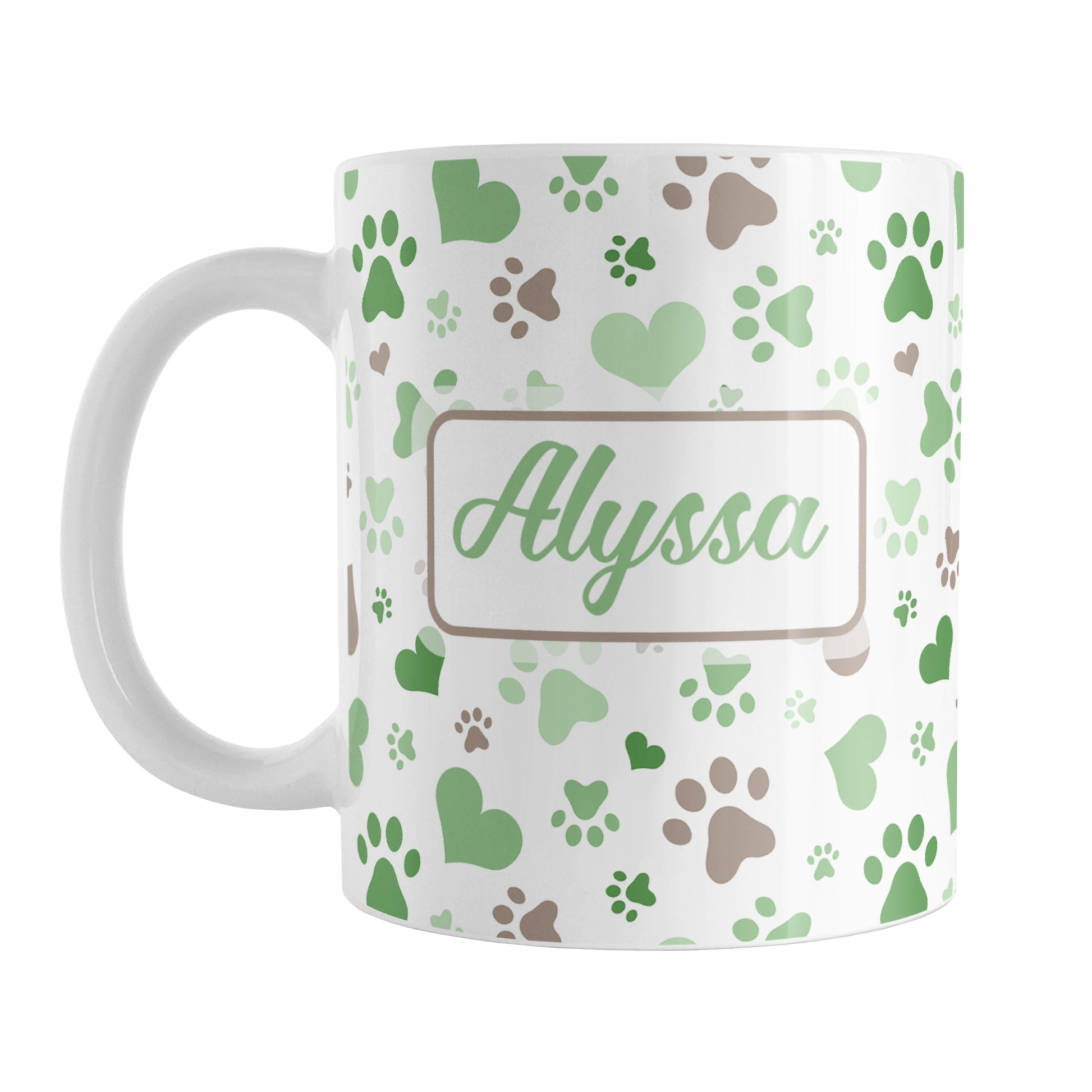 Personalized Green Hearts and Paw Prints Mug (11oz) at Amy's Coffee Mugs. A ceramic coffee mug designed with a pattern of hearts and paw prints in green and brown that wraps around the mug to the handle. Your name is personalized in green on both sides of the mug.
