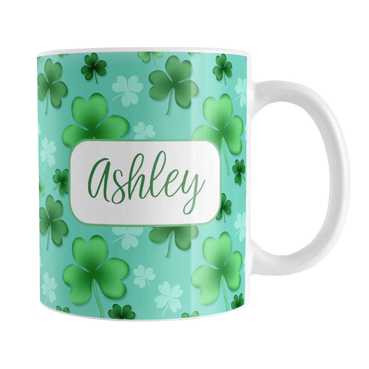 Personalized Lucky Clover Pattern Teal and Green Mug (11oz) at Amy's Coffee Mugs. A ceramic coffee mug designed with a lucky green clover pattern with a 4-leaf clover among 3-leaf clovers, in different shades of green, over a teal background that wraps around the mug to the handle. Your name is personalized in green on white, over the lucky clover pattern.