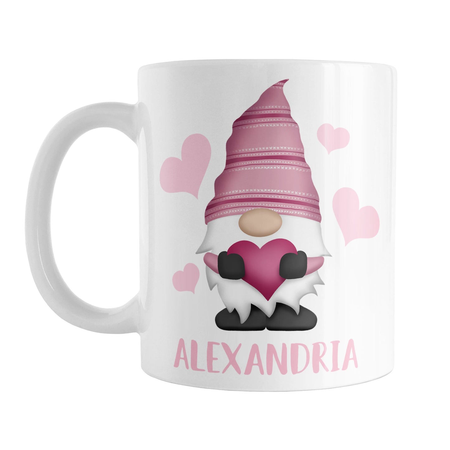 Personalized Pink Heart Gnome Mug (11oz) at Amy's Coffee Mugs. A ceramic coffee mug designed with an illustration of an adorable gnome with a pink pointed hat, holding a big pink heart, with light pink hearts around it. Below the gnome is your personalized name custom printed in a cute pink font. This charming gnome and personalized name are printed on both sides of the mug.