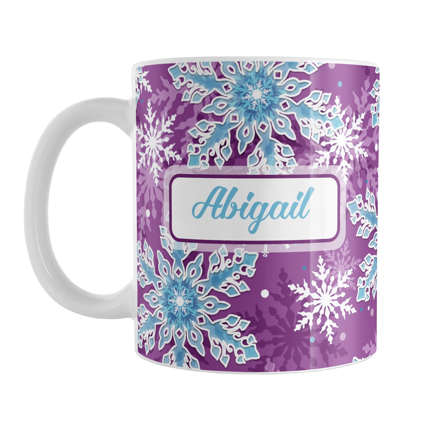 Personalized Purple Blue Snowflake Winter Mug (11oz) at Amy's Coffee Mugs. A ceramic coffee mug designed with a pattern of aqua blue and white snowflakes over a purple background color that wraps around the mug to the handle. Your name is custom printed in an aqua blue script font on both sides of this winter themed mug.