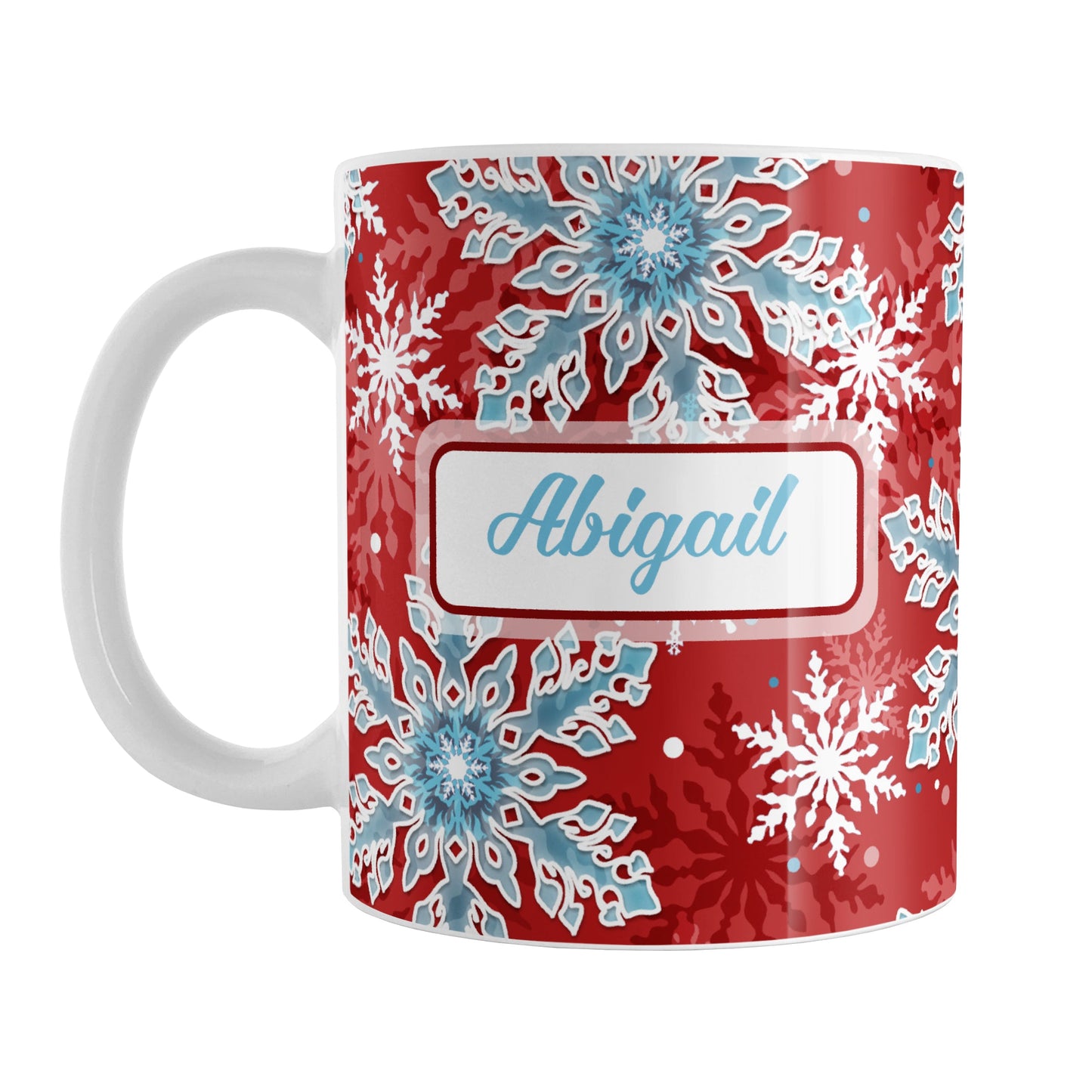Personalized Red Blue Snowflake Winter Mug (11oz) at Amy's Coffee Mugs. A ceramic coffee mug designed with a pattern of aqua blue and white snowflakes over a red background color that wraps around the mug to the handle. Your name is custom printed in an aqua blue script font on both sides of the mug.