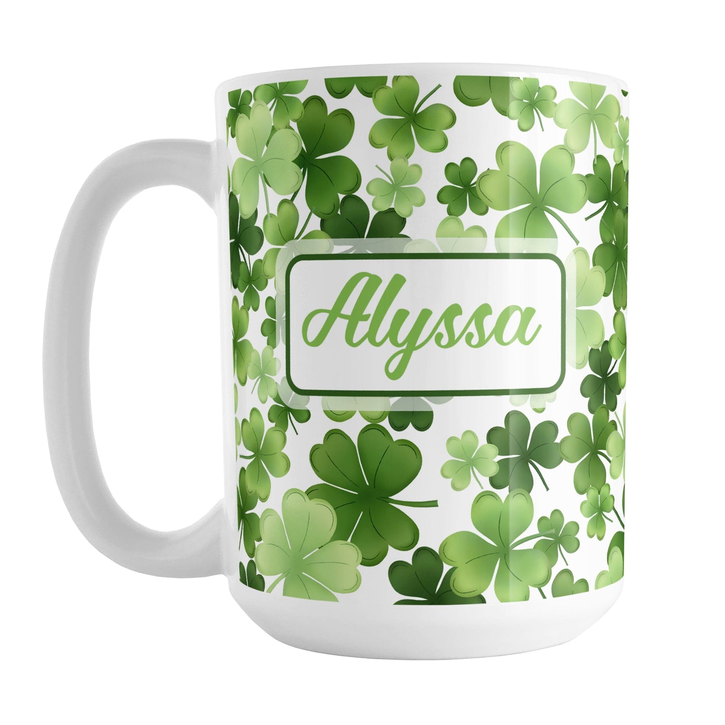 Personalized Shamrocks and 4-Leaf Clovers Mug (15oz) at Amy's Coffee Mugs. A ceramic coffee mug designed with an organic-like pattern of green shamrocks and 4-leaf clovers in different shades of green and is personalized with your name in green on both sides of the mug. This illustrated shamrocks pattern is printed around the mug up to the handle.