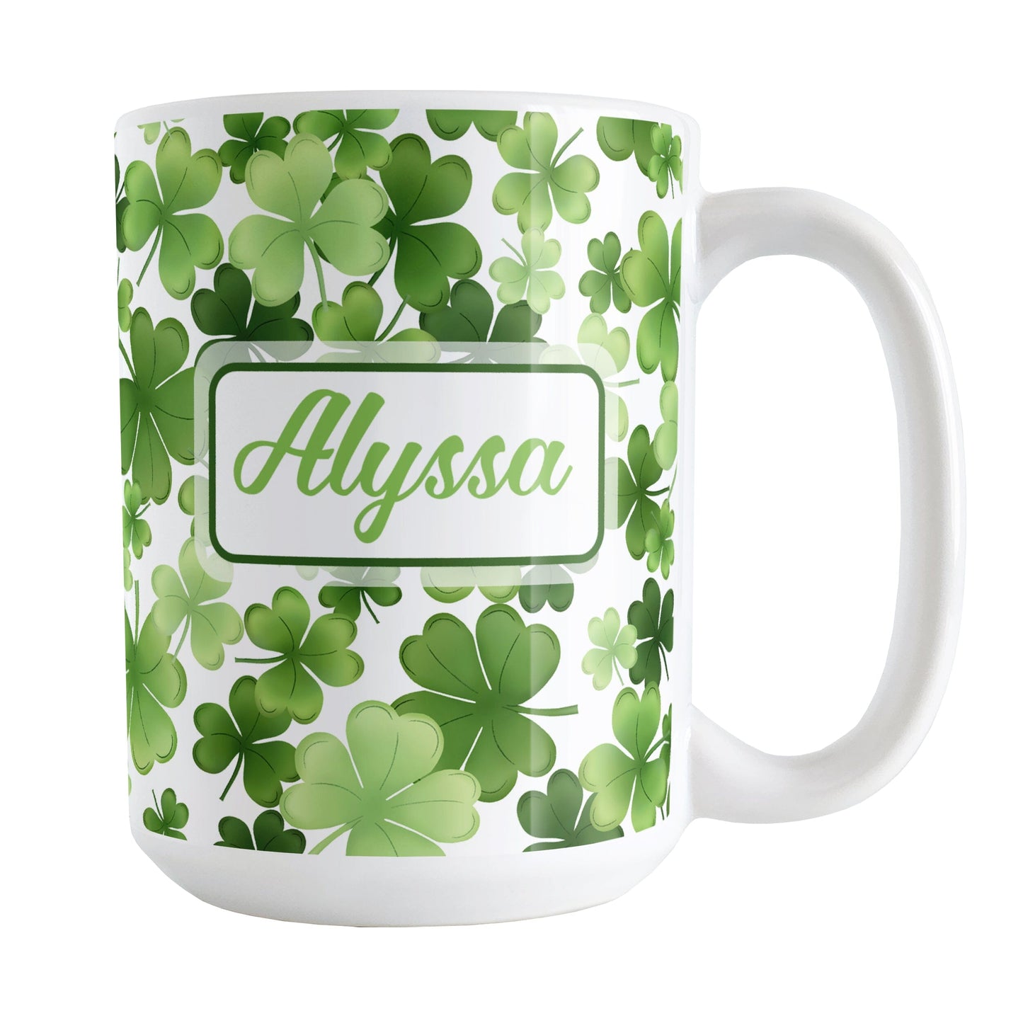 Personalized Shamrocks and 4-Leaf Clovers Mug (15oz) at Amy's Coffee Mugs. A ceramic coffee mug designed with an organic-like pattern of green shamrocks and 4-leaf clovers in different shades of green and is personalized with your name in green on both sides of the mug. This illustrated shamrocks pattern is printed around the mug up to the handle.