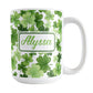 Personalized Shamrocks and 4-Leaf Clovers Mug (15oz) at Amy's Coffee Mugs. A ceramic coffee mug designed with an organic-like pattern of green shamrocks and 4-leaf clovers in different shades of green and is personalized with your name in green on both sides of the mug. This illustrated shamrocks pattern is printed around the mug up to the handle.