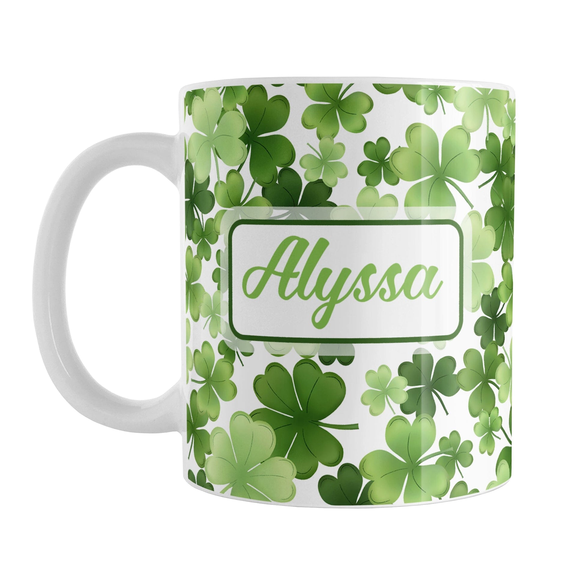 Personalized Shamrocks and 4-Leaf Clovers Mug (11oz) at Amy's Coffee Mugs. A ceramic coffee mug designed with an organic-like pattern of green shamrocks and 4-leaf clovers in different shades of green and is personalized with your name in green on both sides of the mug. This illustrated shamrocks pattern is printed around the mug up to the handle.
