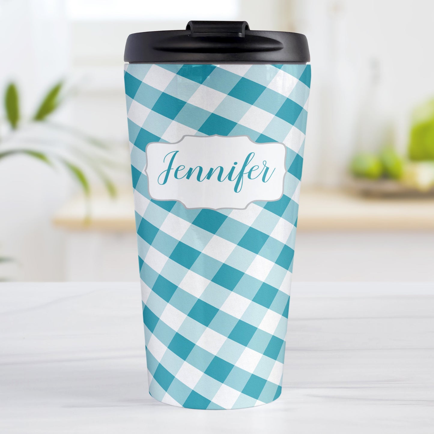 Personalized Turquoise Gingham Travel Mug (15oz, stainless steel insulated) at Amy's Coffee Mugs. A travel mug designed with a slanted turquoise and white gingham pattern that wraps around the travel mug. Your personalized name is custom-printed in a turquoise script font in a white frame design over the gingham pattern.