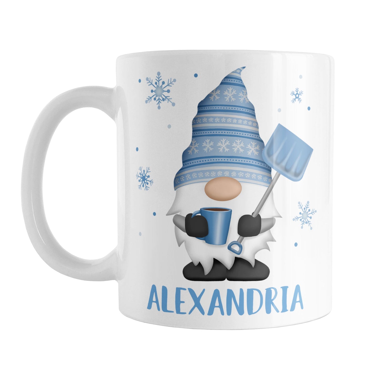 Personalized Winter Snowflake Gnome Mug (11oz) at Amy's Coffee Mugs. A ceramic coffee mug designed with a gnome on both sides of the mug wearing a festive blue snowflake hat and holding a hot beverage and a snow shovel, with snowflakes around it. Your name is custom printed in blue below the gnome.