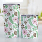 Pink Green Brown Floral Pattern Tumbler Cup (20oz on 10oz, stainless steel insulated) at Amy's Coffee Mugs. A tumbler cup designed with flowers and leaves in pink, green, and brown in a pretty floral pattern that wraps around the cup. Photo shows both sized cups on a table next to each other.