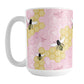 Pink Honeycomb Bee Mug (15oz) at Amy's Coffee Mugs. A ceramic coffee mug designed with a pattern of black and yellow bees on honeycomb lines over a pink flourish background that wraps around the mug to the handle.