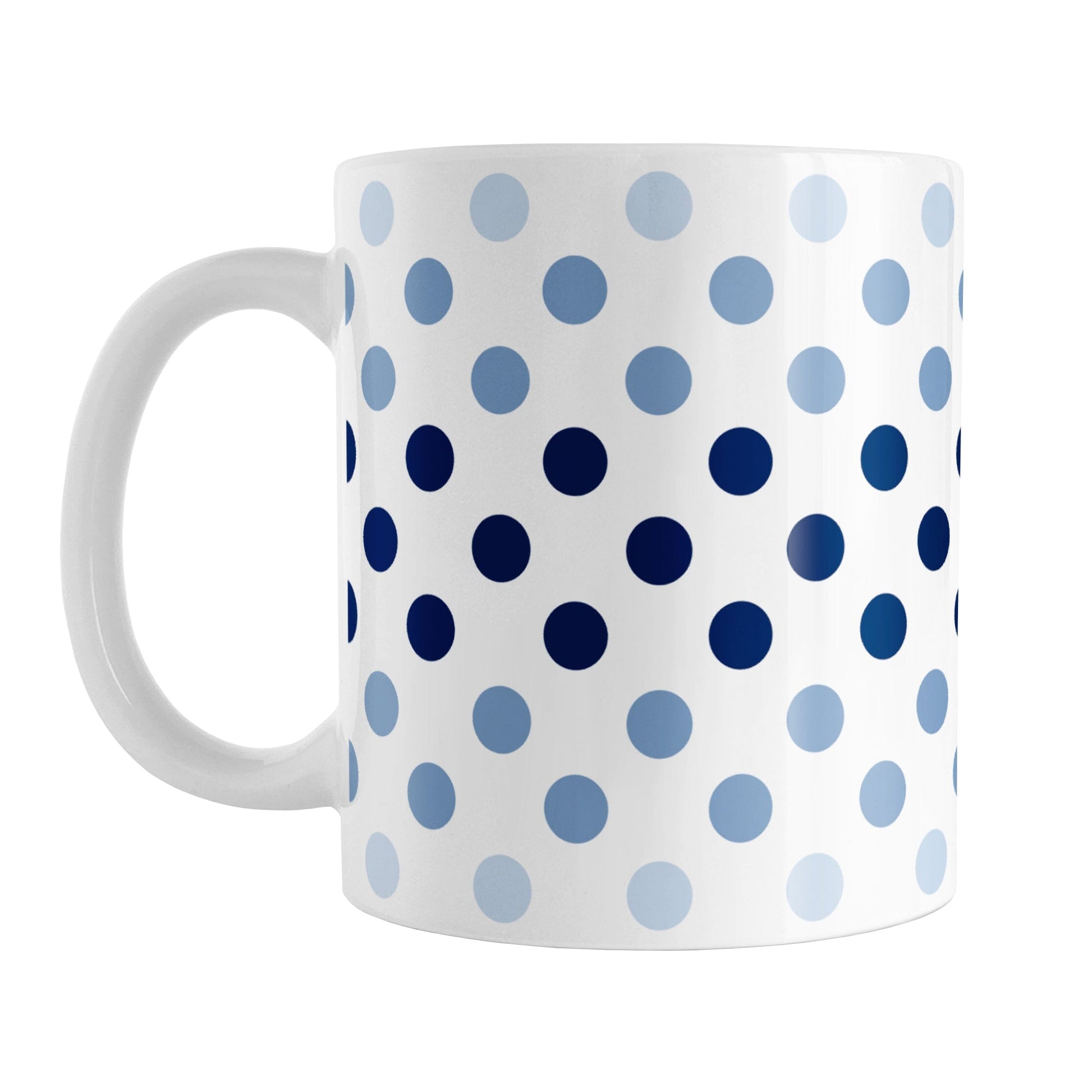 Polka Dots in Blue Mug (11oz) at Amy's Coffee Mugs. A ceramic coffee mug designed with polka dots in different shades of blue, with the darker blue color across the middle and the lighter blue along the top and bottom, in a pattern that wraps around the mug to the handle. 